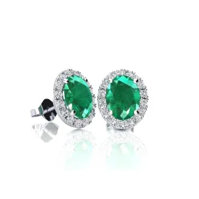 1 3/4 Carat Oval Shape Emerald And Halo Diamond Stud Earrings In 14 Karat White Gold