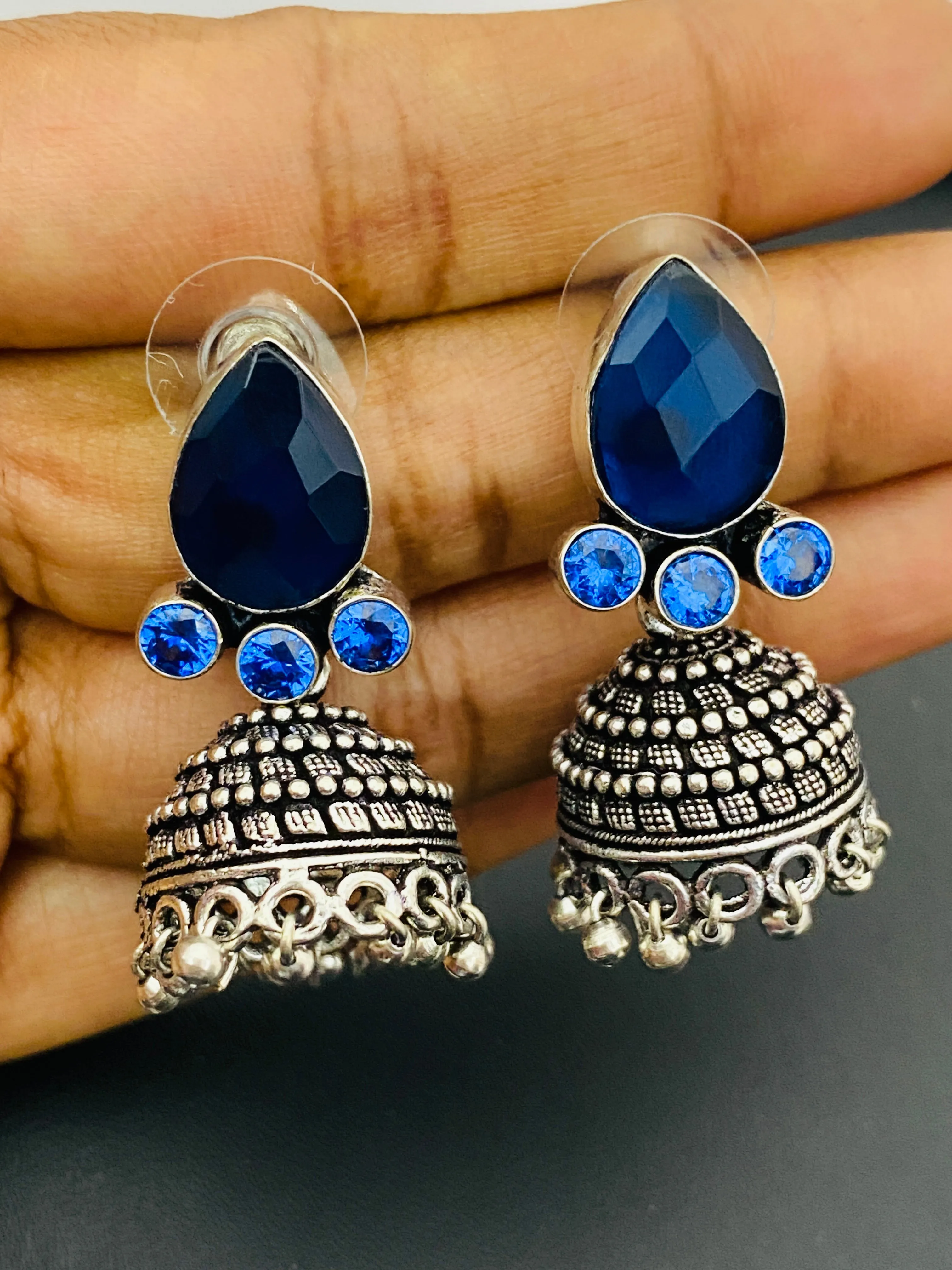 Appealing Dark Blue AD Stone Beaded Ethnic Silver Toned Oxidized Light Weighted Jhumka Earrings