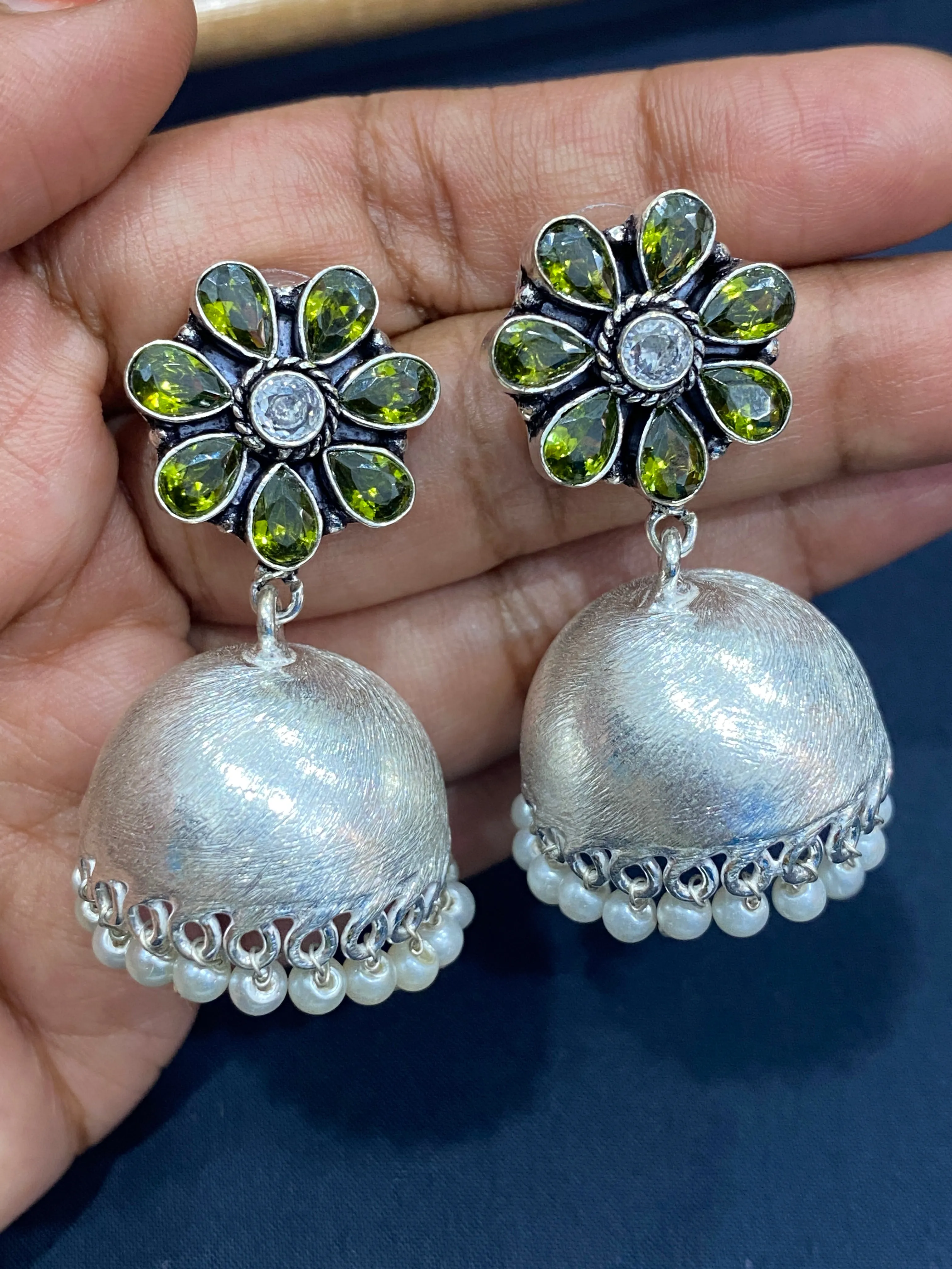 Blooming Green Floral German Silver Plated Oxidized Jhumka Earrings With Pearl Drops