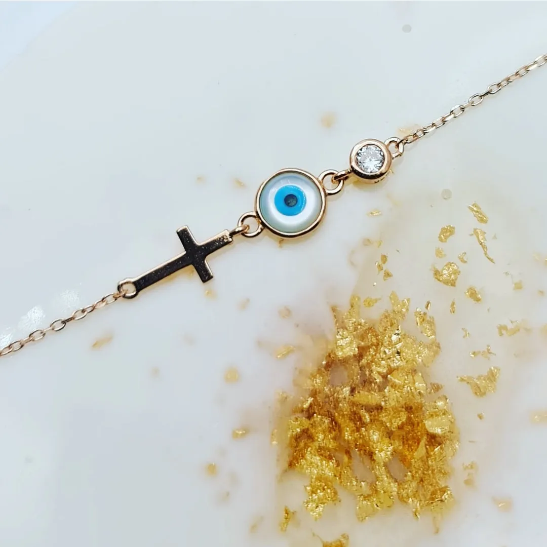 Dede mother of pearl evil eye and cross bracelet in rosegold